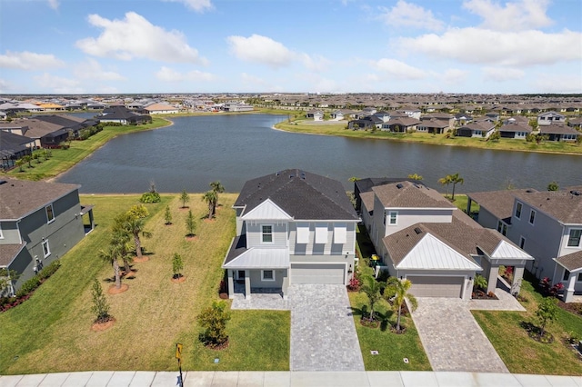 2476 Kamin Dr, Melbourne, FL 32940 - bird's eye view featuring a water view and a residential view