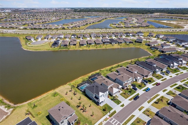 2476 Kamin Dr, Melbourne, FL 32940 - bird's eye view with a water view and a residential view