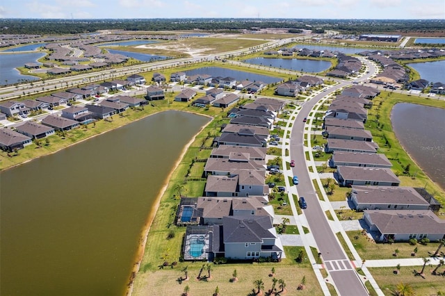 2476 Kamin Dr, Melbourne, FL 32940 - birds eye view of property featuring a residential view and a water view