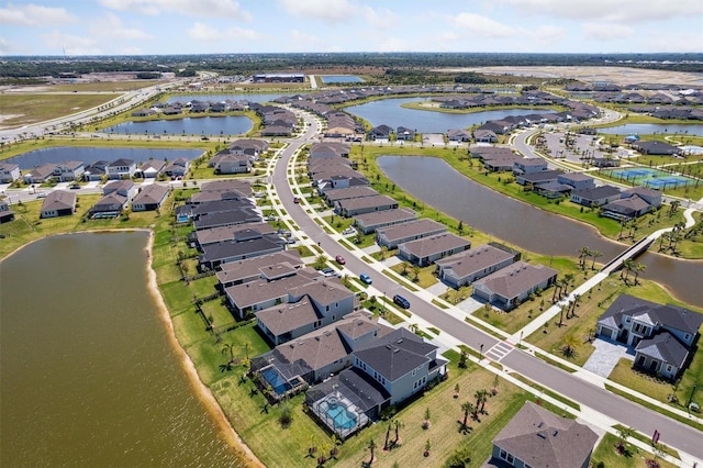 2476 Kamin Dr, Melbourne, FL 32940 - birds eye view of property with a water view and a residential view