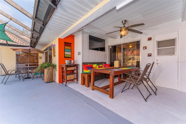 5053 Maui Cir Unit 14, Orlando, FL 32808 - view of patio / terrace featuring a ceiling fan and outdoor dining space