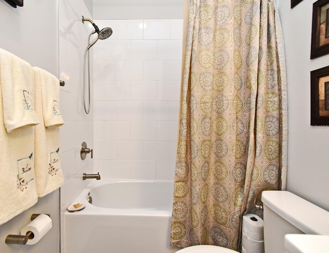 bathroom with toilet and shower / tub combo with curtain