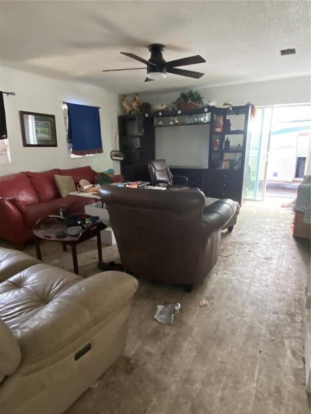 225 Ronnie Cir, Orlando, FL 32811 - living area featuring a textured ceiling and ceiling fan