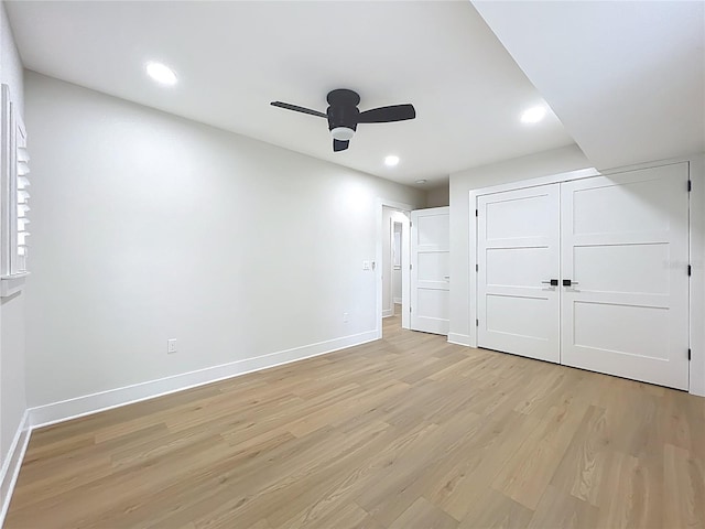 unfurnished bedroom featuring recessed lighting, baseboards, and light wood-style flooring