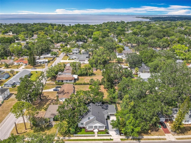 birds eye view of property featuring a residential view and a water view