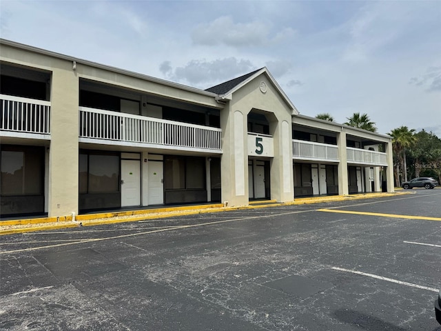 5245 W Irlo Bronson Memorial Hwy Unit 276, Kissimmee, FL 34746 - view of building exterior featuring uncovered parking