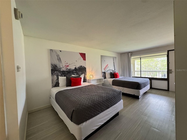 5245 W Irlo Bronson Memorial Hwy Unit 276, Kissimmee, FL 34746 - bedroom featuring wood finished floors