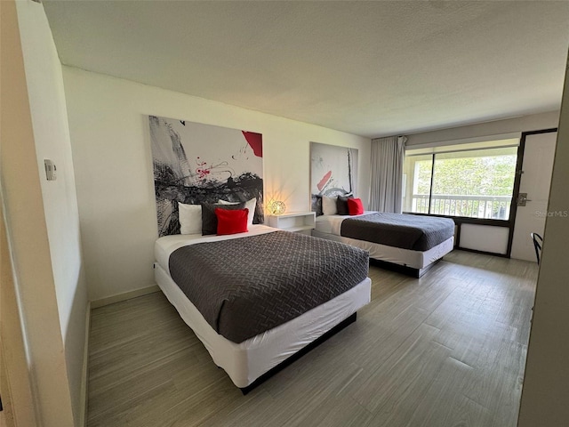 5245 W Irlo Bronson Memorial Hwy Unit 276, Kissimmee, FL 34746 - bedroom featuring wood finished floors