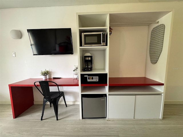 5245 W Irlo Bronson Memorial Hwy Unit 276, Kissimmee, FL 34746 - office featuring baseboards and light wood-type flooring