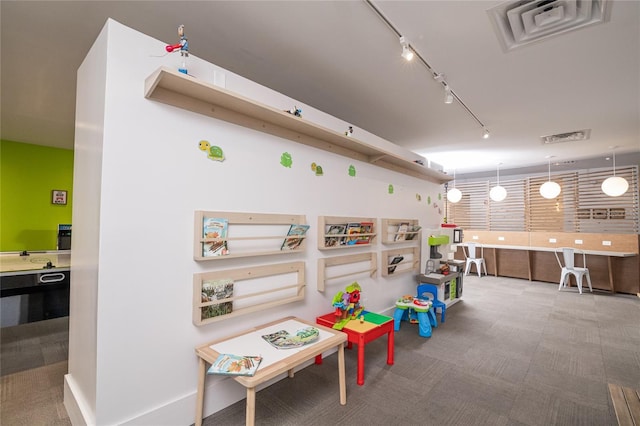 5245 W Irlo Bronson Memorial Hwy Unit 276, Kissimmee, FL 34746 - playroom featuring visible vents, carpet, and track lighting