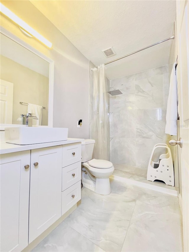 247 Whispering Pines Way, Davenport, FL 33837 - full bathroom with a shower with curtain, vanity, toilet, and marble look tiles
