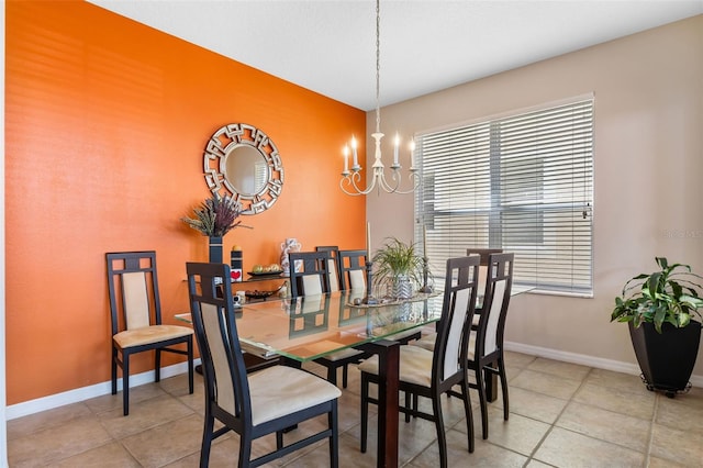 5321 Los Palma Vista Dr, Orlando, FL 32837 - dining room featuring baseboards, light tile patterned floors, and a chandelier