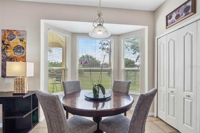 5321 Los Palma Vista Dr, Orlando, FL 32837 - dining area featuring light tile patterned flooring