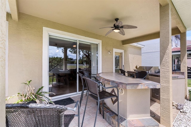5321 Los Palma Vista Dr, Orlando, FL 32837 - view of patio featuring ceiling fan, outdoor wet bar, and area for grilling