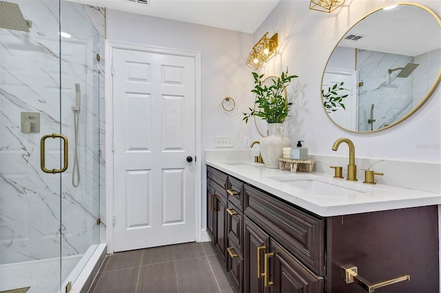 1176 Epson Oaks Way, Orlando, FL 32837 - full bathroom featuring double vanity, a sink, a marble finish shower, and visible vents
