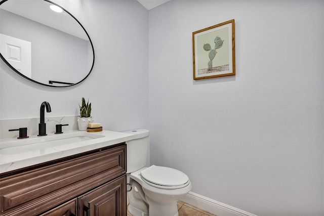 1176 Epson Oaks Way, Orlando, FL 32837 - bathroom with baseboards, tile patterned floors, toilet, and vanity