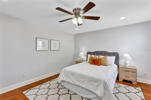 1176 Epson Oaks Way, Orlando, FL 32837 - bedroom featuring baseboards, recessed lighting, a textured ceiling, and ceiling fan