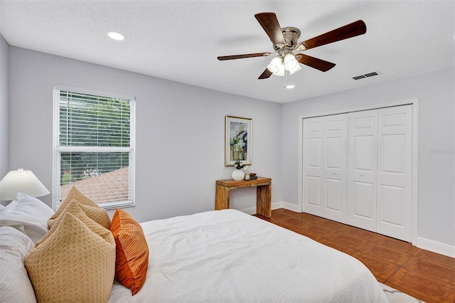 1176 Epson Oaks Way, Orlando, FL 32837 - bedroom with recessed lighting, baseboards, a ceiling fan, visible vents, and a closet