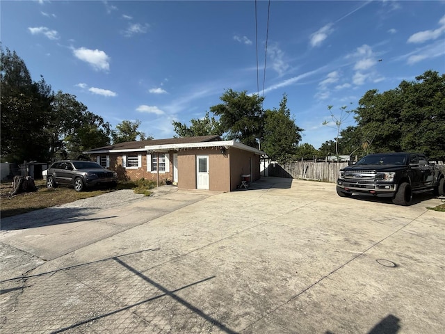 311 Congress Ave, Auburndale, FL 33823 - ranch-style home featuring fence and driveway