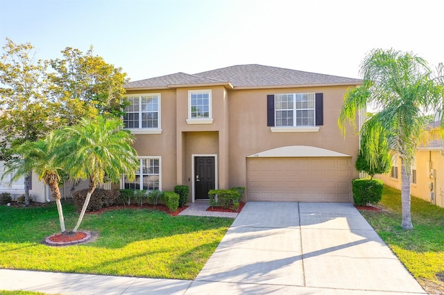 156 Bristol Forest Trl, Sanford, FL 32771 - view of front of property featuring a front yard, an attached garage, stucco siding, and driveway