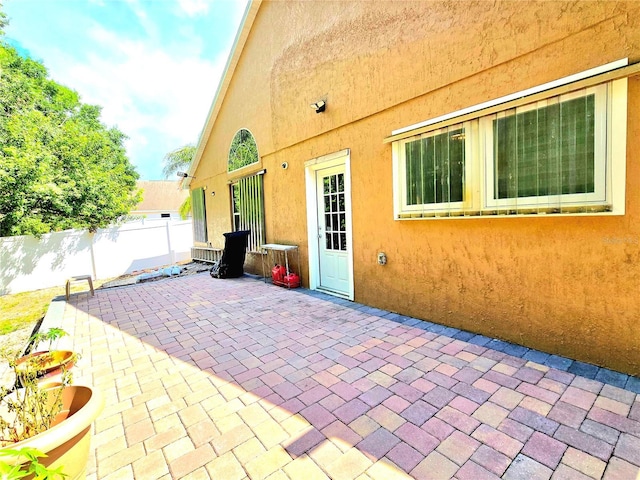 2346 Lily Pad Ln, Kissimmee, FL 34743 - view of patio with fence