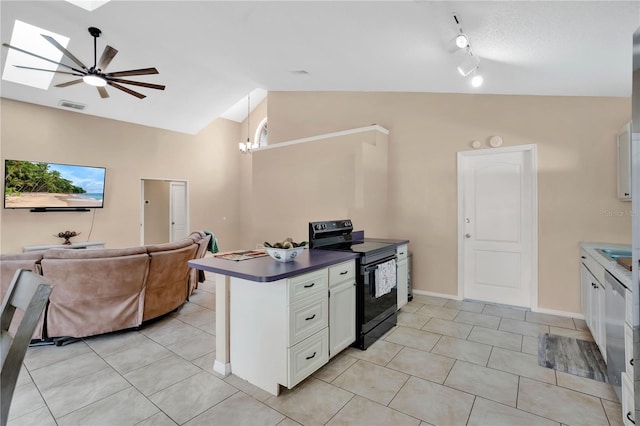 kitchen featuring ceiling fan, vaulted ceiling with skylight, open floor plan, visible vents, and black range with electric stovetop