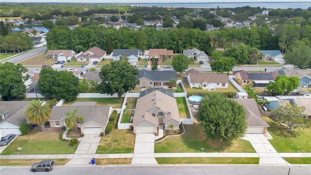 aerial view featuring a water view and a residential view