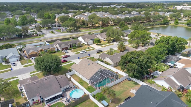aerial view featuring a water view and a residential view