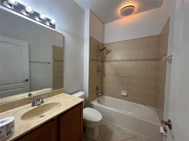 full bath with tile patterned flooring, vanity, toilet, a textured ceiling, and  shower combination
