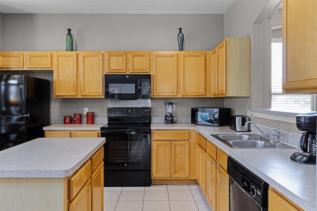 209 Rosso Dr, Davenport, FL 33837 - kitchen featuring black appliances, light brown cabinetry, a sink, light tile patterned flooring, and a textured ceiling