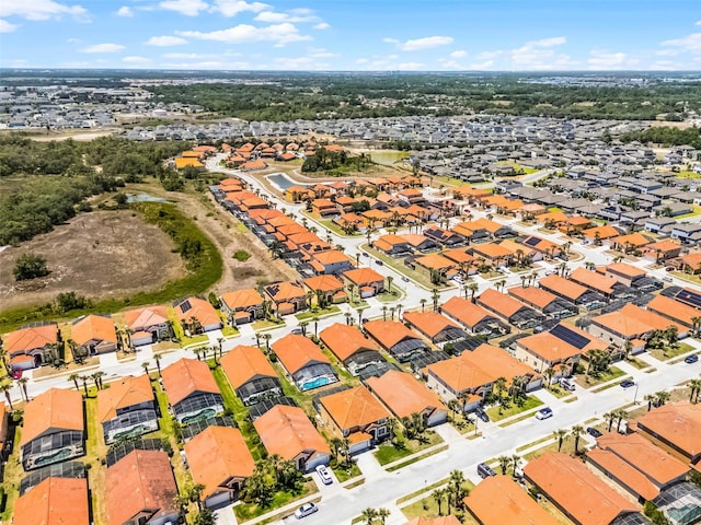 209 Rosso Dr, Davenport, FL 33837 - aerial overview of property's location with nearby suburban area