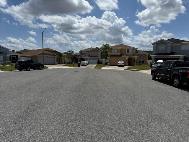view of road featuring street lighting and a residential view