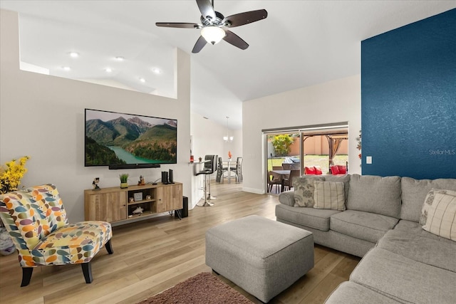 131 Highland Meadows Pl, Davenport, FL 33837 - living room with high vaulted ceiling, wood finished floors, ceiling fan, and recessed lighting