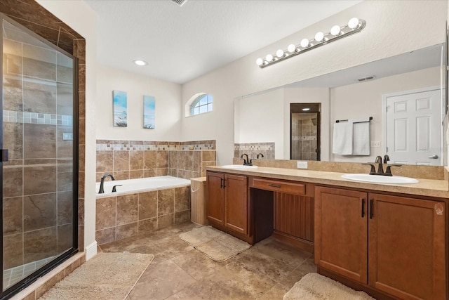 131 Highland Meadows Pl, Davenport, FL 33837 - full bath with a shower stall, a garden tub, and double vanity