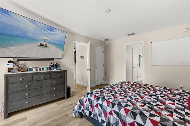 131 Highland Meadows Pl, Davenport, FL 33837 - bedroom featuring light wood-style floors and baseboards