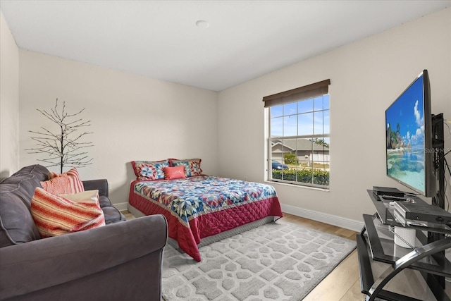 131 Highland Meadows Pl, Davenport, FL 33837 - bedroom with wood finished floors and baseboards