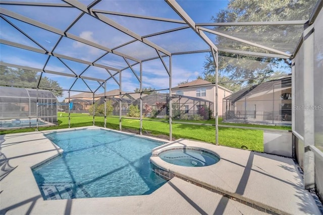 2632 Emerald Island Blvd, Kissimmee, FL 34747 - view of pool featuring a patio, a lawn, glass enclosure, a pool with connected hot tub, and a residential view
