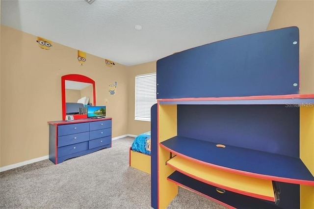 2632 Emerald Island Blvd, Kissimmee, FL 34747 - bedroom with baseboards, carpet, and a textured ceiling