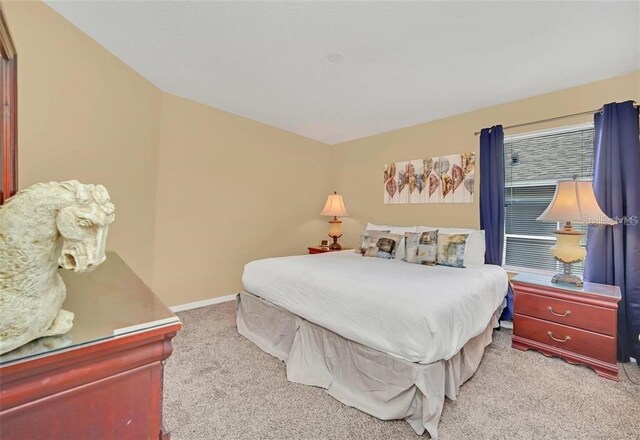 2632 Emerald Island Blvd, Kissimmee, FL 34747 - bedroom featuring baseboards and carpet