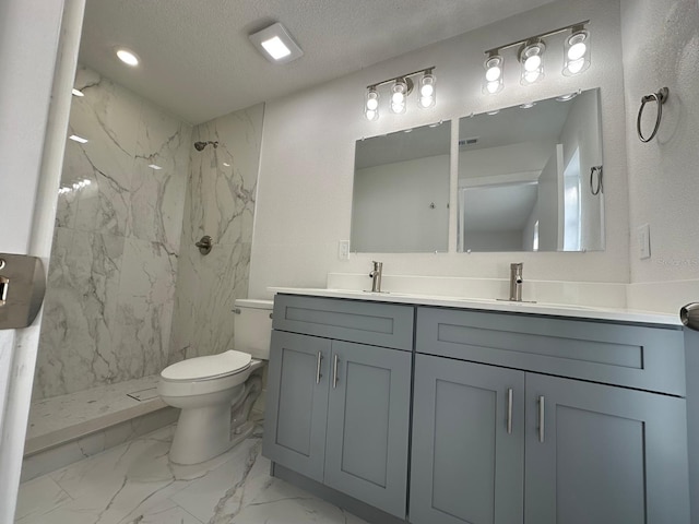 705 Wood Ln, Kissimmee, FL 34759 - bathroom featuring a sink, toilet, a marble finish shower, and marble finish floor