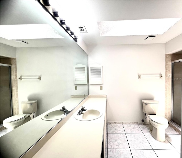849 Long Bay Ct, Kissimmee, FL 34741 - bathroom with toilet, a skylight, a stall shower, and vanity