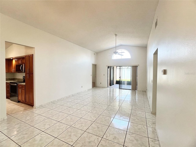 849 Long Bay Ct, Kissimmee, FL 34741 - unfurnished room featuring light tile patterned floors, ceiling fan, and high vaulted ceiling