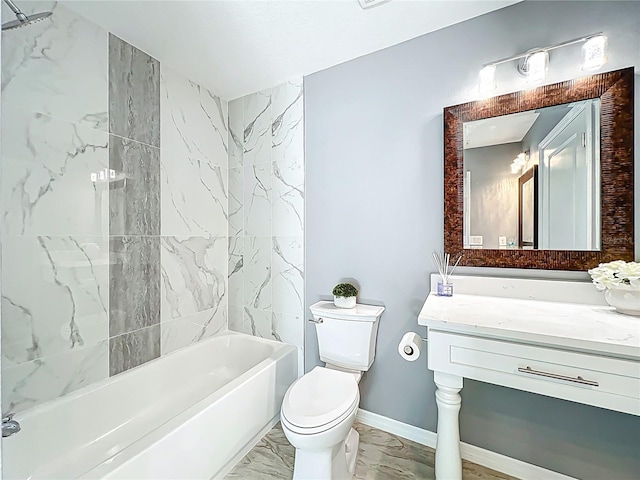 bathroom featuring tub / shower combination, vanity, toilet, and marble finish floor
