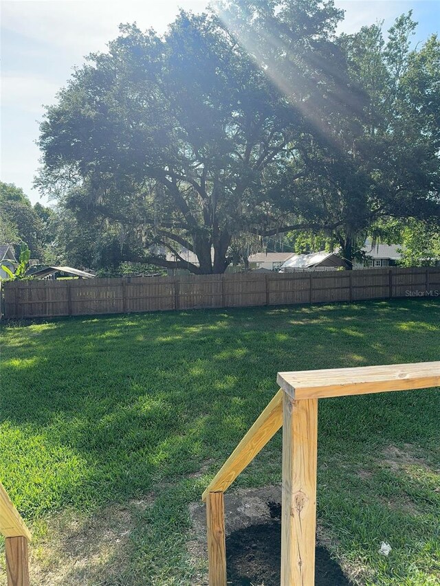 4385 NE 2nd Ct, Ocala, FL 34479 - view of yard featuring fence