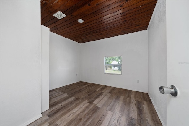 31 Cedar St, Haines City, FL 33844 - unfurnished room featuring visible vents, baseboards, wood finished floors, and wooden ceiling