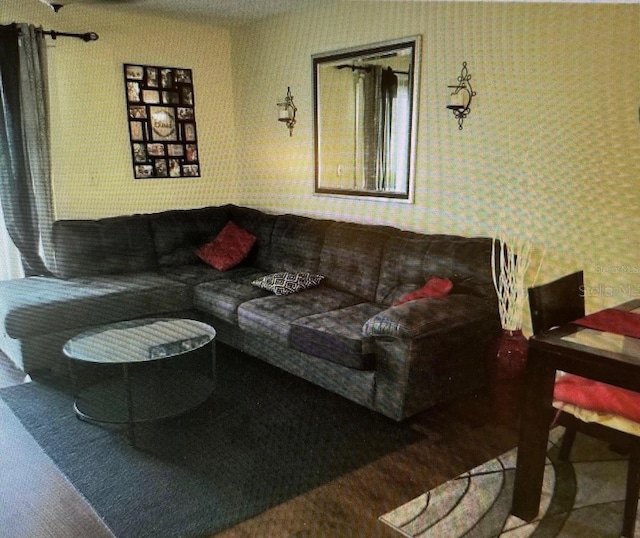 living area featuring wallpapered walls