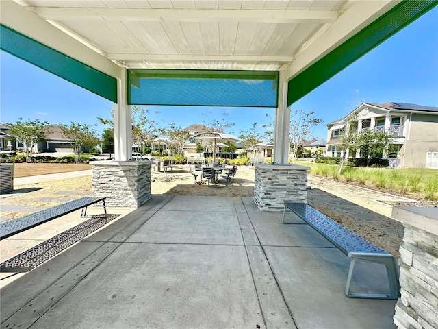 view of patio with a porch and a residential view