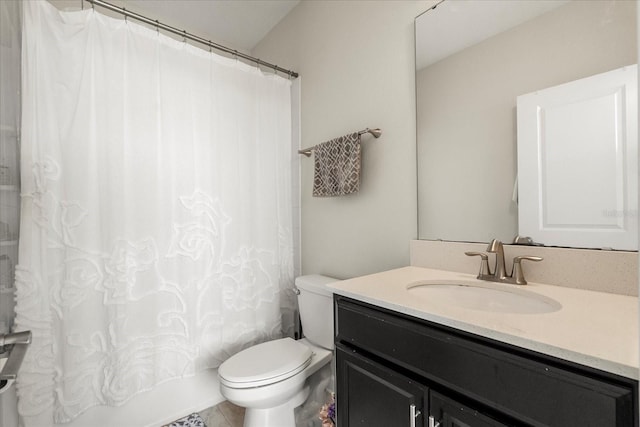 full bathroom with vanity, tile patterned flooring, toilet, and shower / tub combo