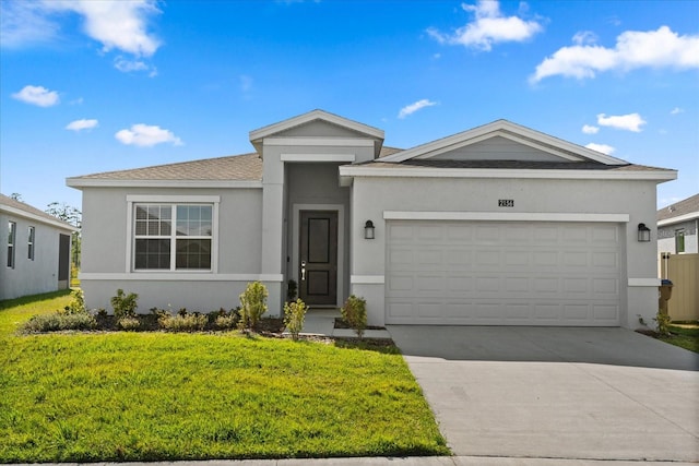 2156 Merrybells Dr, Kissimmee, FL 34746 - single story home featuring a garage, concrete driveway, a front lawn, and stucco siding