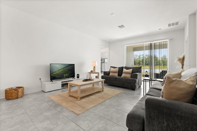 2156 Merrybells Dr, Kissimmee, FL 34746 - living area with light tile patterned floors and baseboards